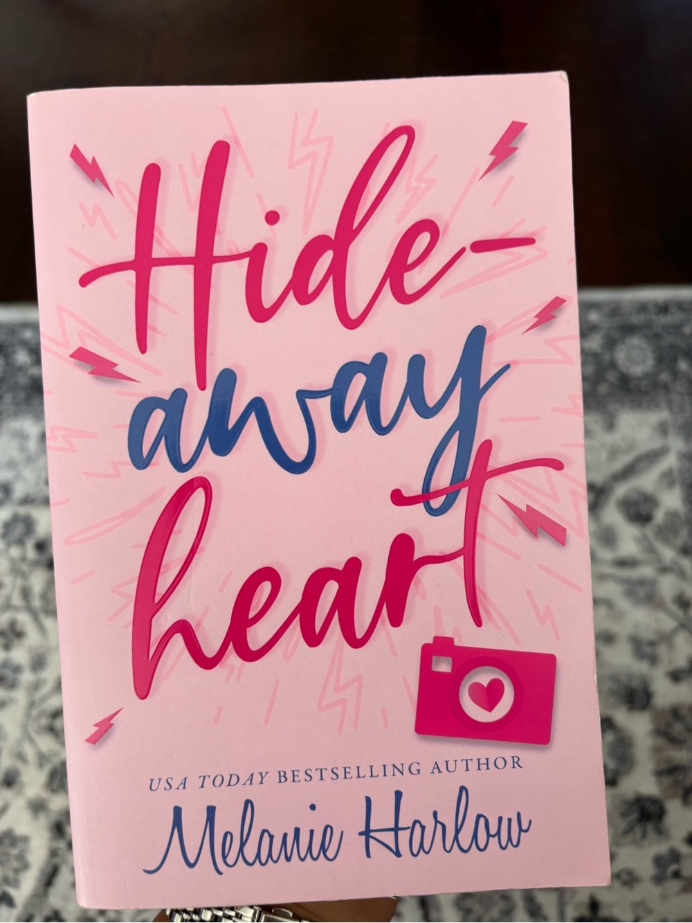 “Hideaway Heart” Pink Paperback by Melanie Harlow